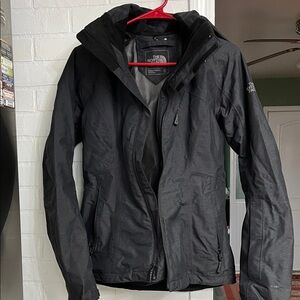 The North Face Women’s Performance Black Jacket with inner jacket.  Worn once!